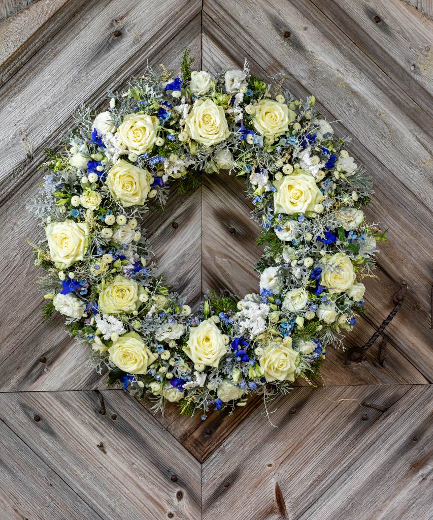 Wreath on a plastic foam base, for Christmas on the door or on the table. In my colours white with a touch of blue.